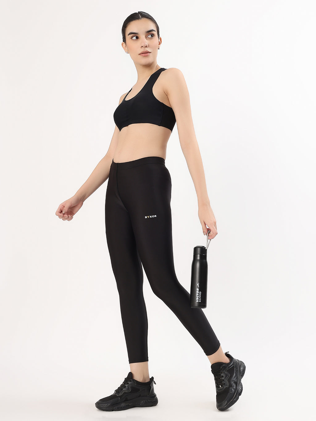 BYXOR Women's Leggings Black – BYXOR logo close up on thigh